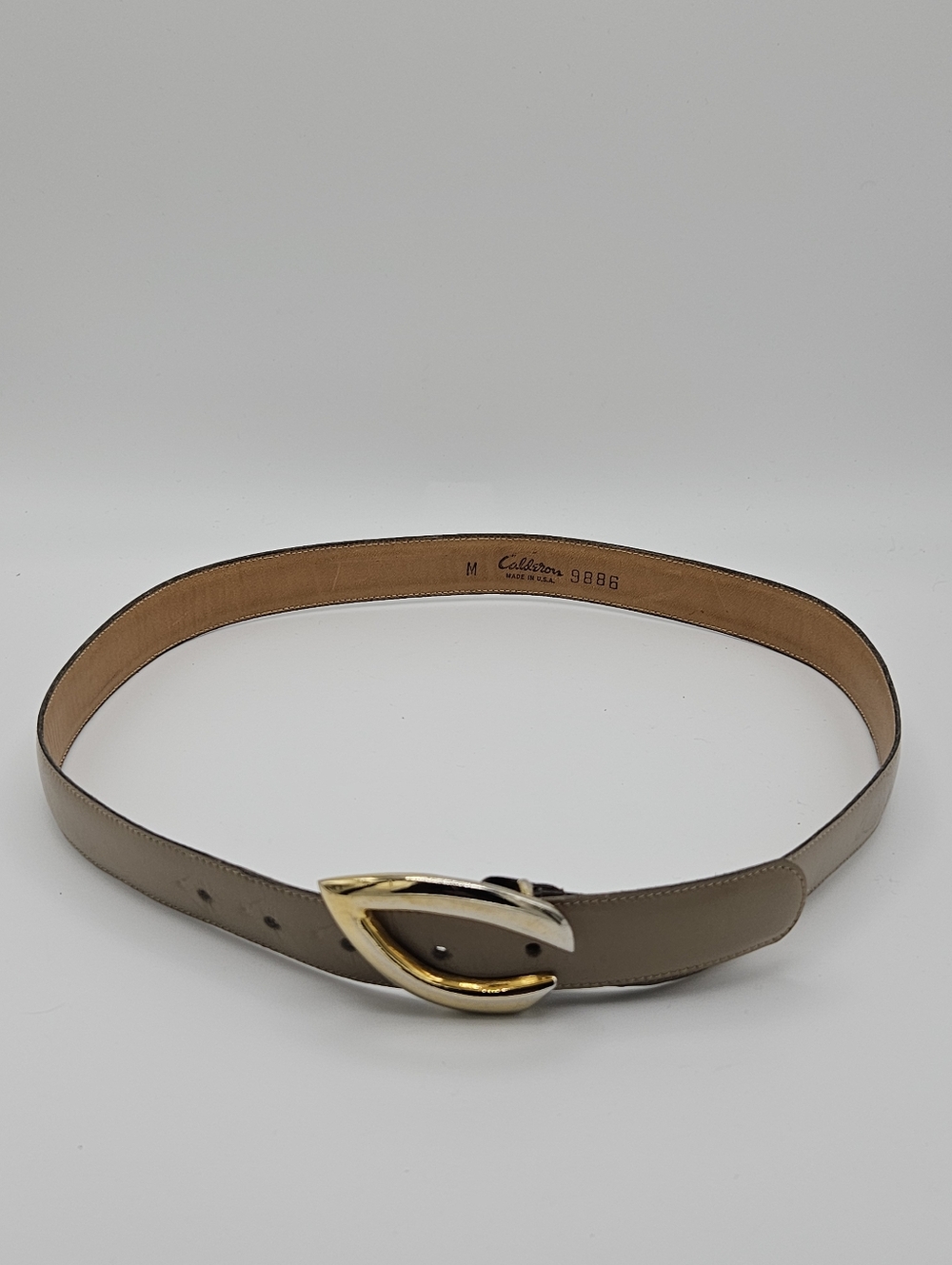 vintage Calderon tan belt with stylized gold tone C buckle medium